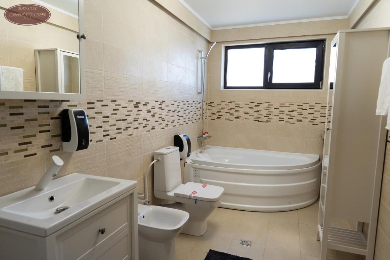 Campus Caffe Mansion Hotel บูเซา ภายนอก รูปภาพ