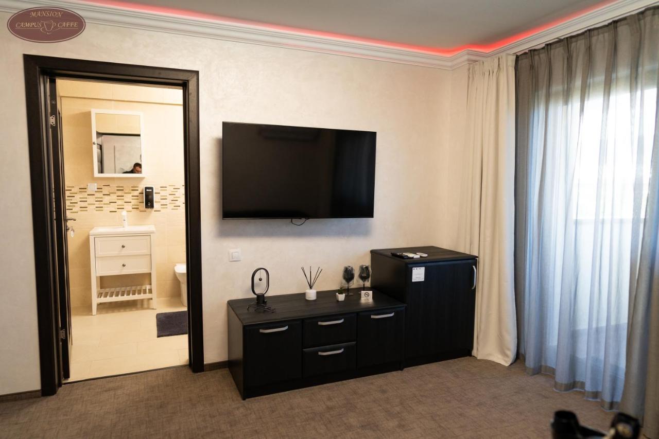 Campus Caffe Mansion Hotel บูเซา ภายนอก รูปภาพ